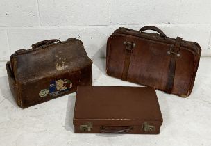 Three vintage leather cases including Gladstone bag, small suitcase etc.