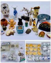 A collection of dolls house accessories including wooden bowls, dinner set, vases, pots, animals,