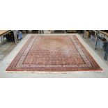 A large 'Saint-Maclou' Eastern style red ground rug - 240cm x 340cm