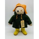 A vintage Gabrielle Designs Ltd "Paddington Bear" in orange hat, green coat and yellow boots, with