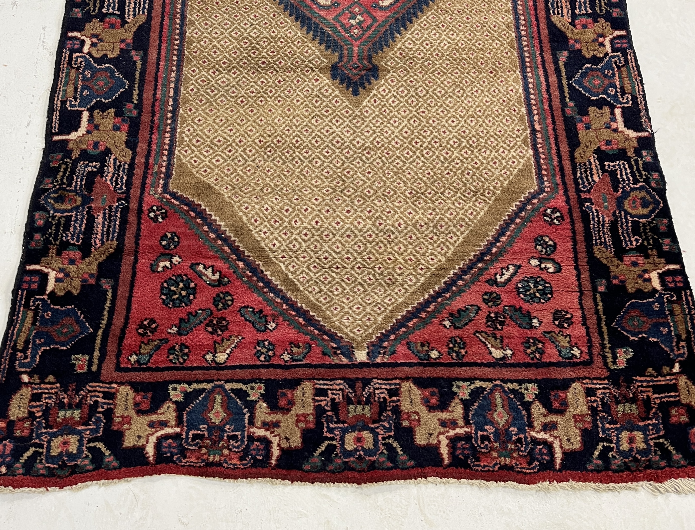 A Eastern red ground rug with central motif - 212cm x 122cm - Image 2 of 4