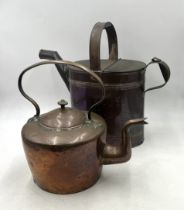 A large copper kettle plus a copper 10 quart watering can.