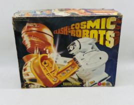 A vintage boxed Marx Toys Clash of the Cosmic Robots Rocking Dodging Punching Action game