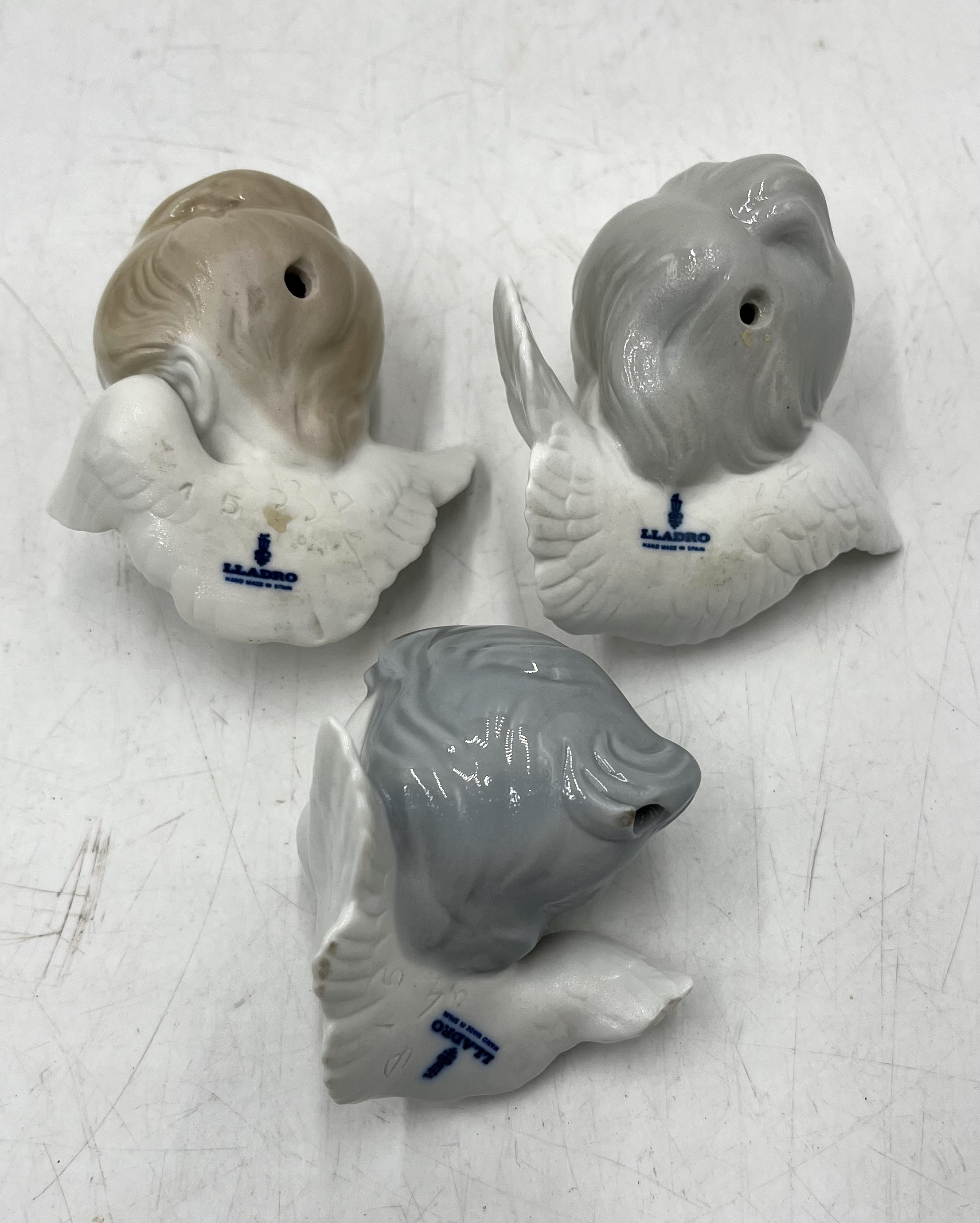 Three Lladro Cherub heads along with three Sylvac ceramics including No.1969 Pixies looking into a - Image 2 of 17