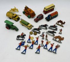 A collection of vintage die-cast Dinky vehicles and tinplate clockwork Regent petrol tanker (no