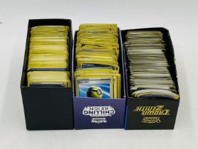 A collection of Pokemon cards from various sets including some holograms etc