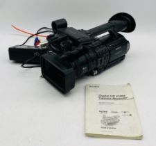 A vintage unboxed Sony Digital HDV 1080i Camera Recorder, along with cables, power unit and Sony