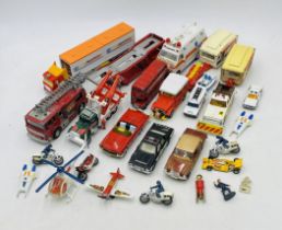 A collection of playworn die-cast vehicles including Corgi Toys, Dinky Toys, Matchbox, Mojorette,