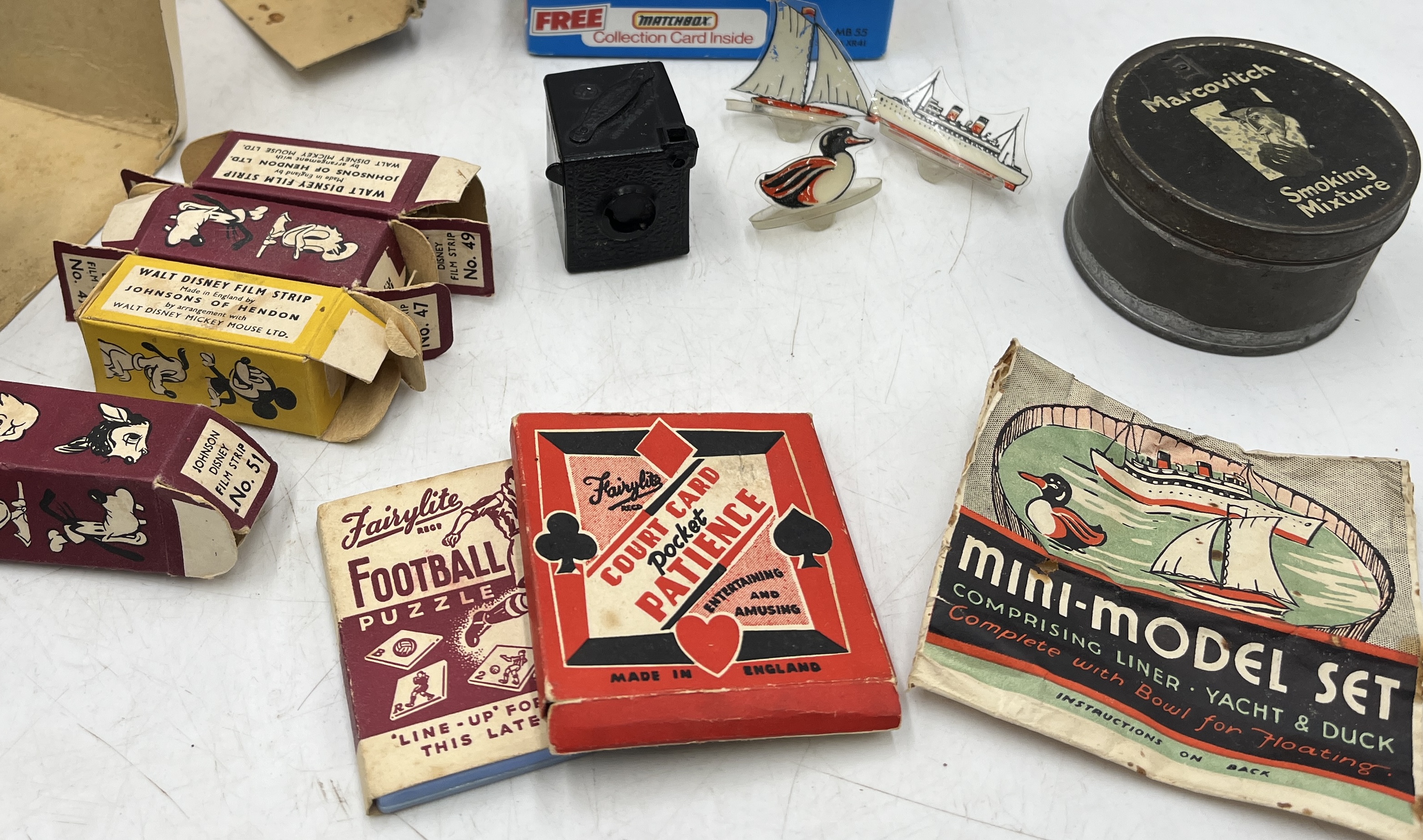 A collection of vintage toys including Johnson Disney projector, Matchbox car, solitaire etc. - Image 3 of 3