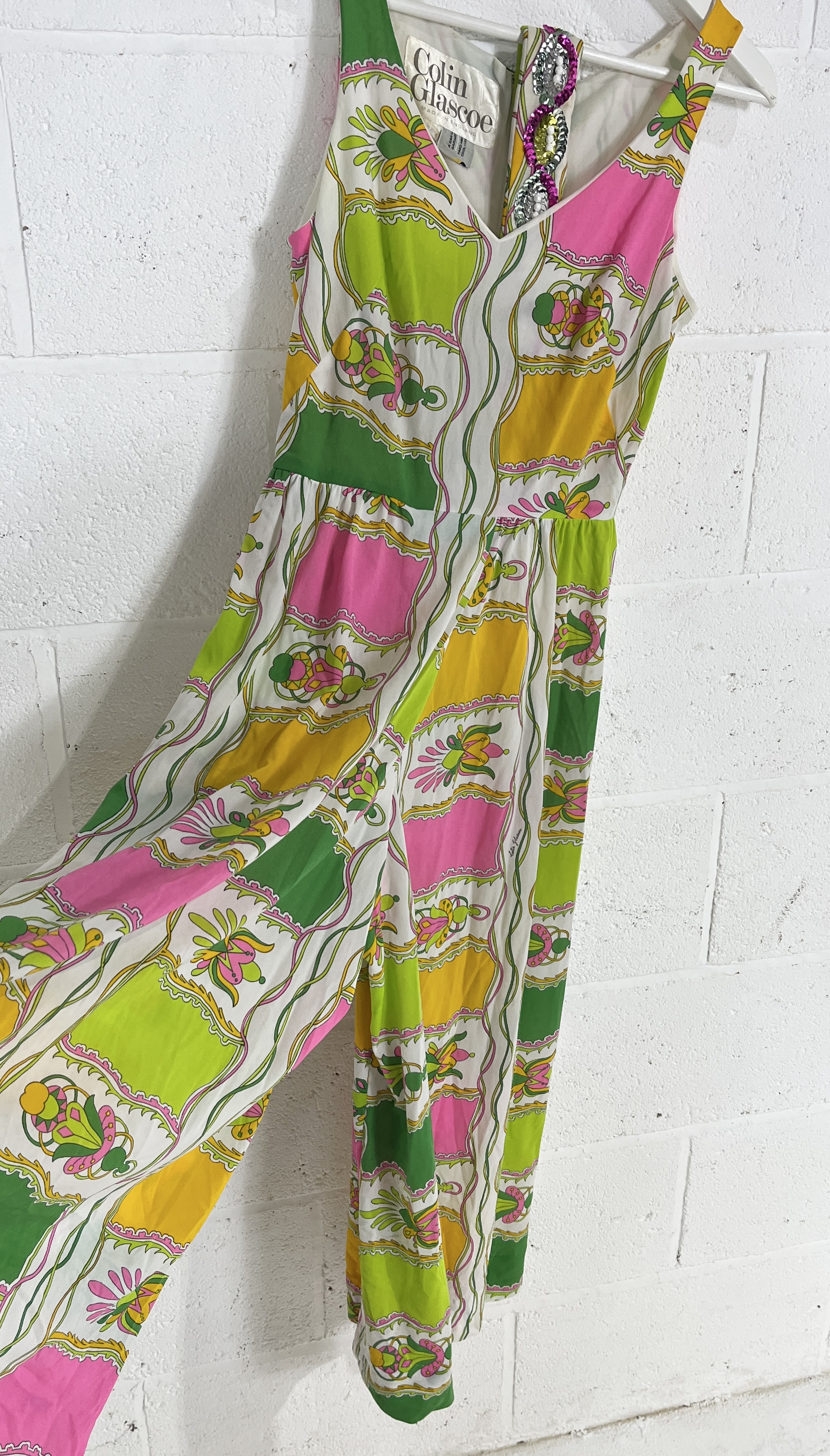 A vintage 1970's jumpsuit by Colin Glascoe with brightly coloured floral design - Image 2 of 6