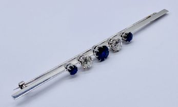 An Art Deco 18ct white gold bar brooch set with diamonds and sapphires- diamonds measure approx. 5mm