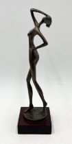 A mid century bronze of female nude on wooden base - height 28cm