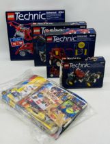 Four boxed Lego Technic sets (8064, 8836, 8044 & 8832), along with a collection of various Lego