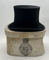 A vintage velvet top hat in Christys box