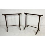 A pair of vintage cast iron trestle table supports, 74.5cm wide x 75cm high.