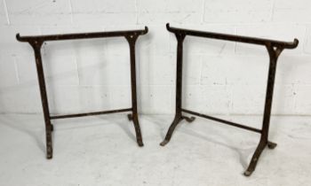 A pair of vintage cast iron trestle table supports, 74.5cm wide x 75cm high.