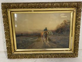 A large gilt framed watercolour of a man on horseback leading another horse signed Arthur C