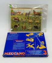 A boxed Meccano Enthusiast No 3 set, along with a vintage wooden farm animal jig-saw puzzle