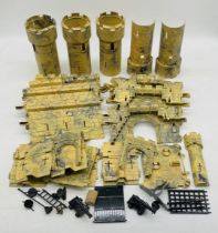 An unboxed Kleeware Crusaders Castle with assembly instructions