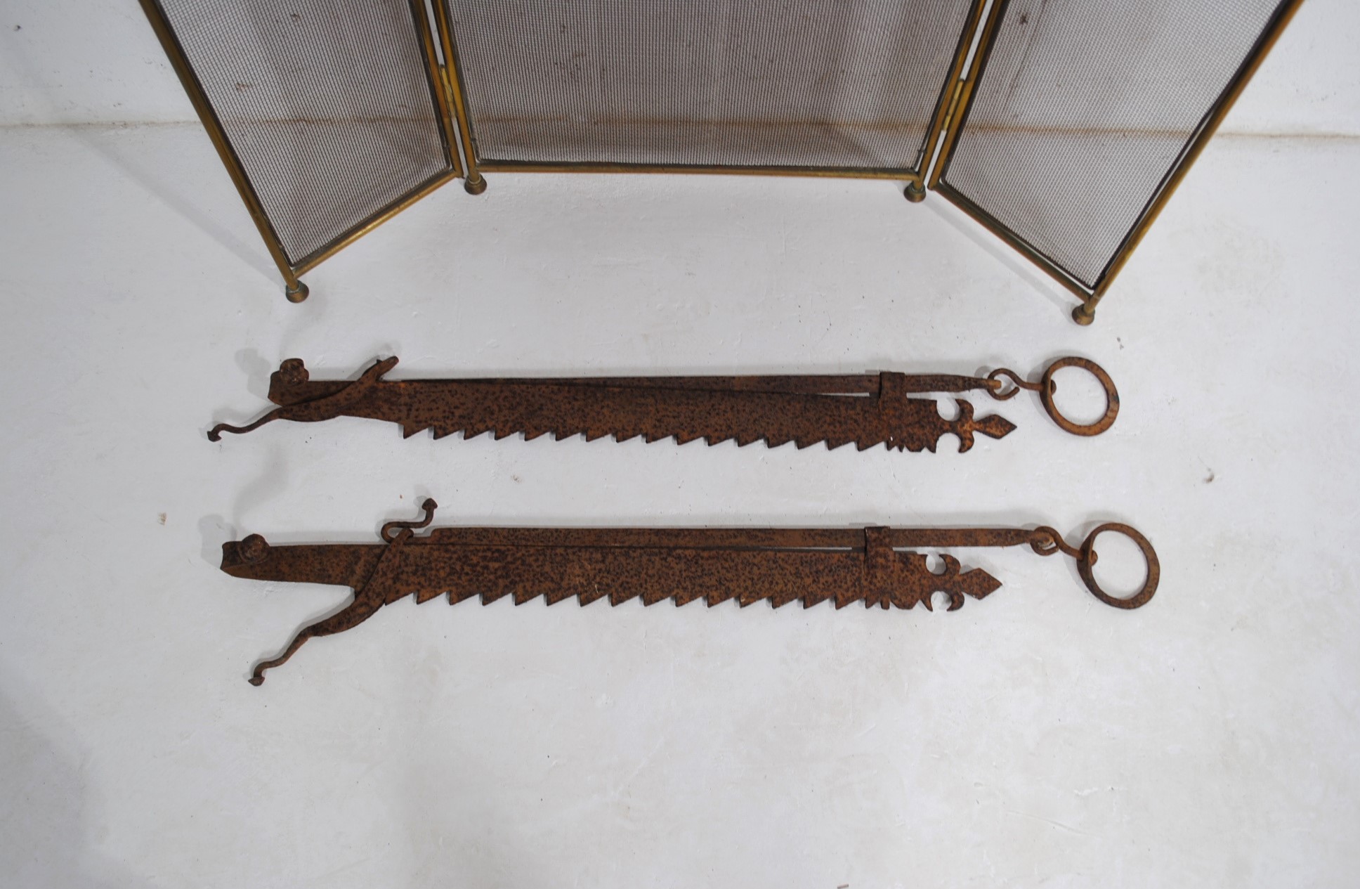 A pair of antique chimney crooks, along with a brass folding fire guard - Image 4 of 4
