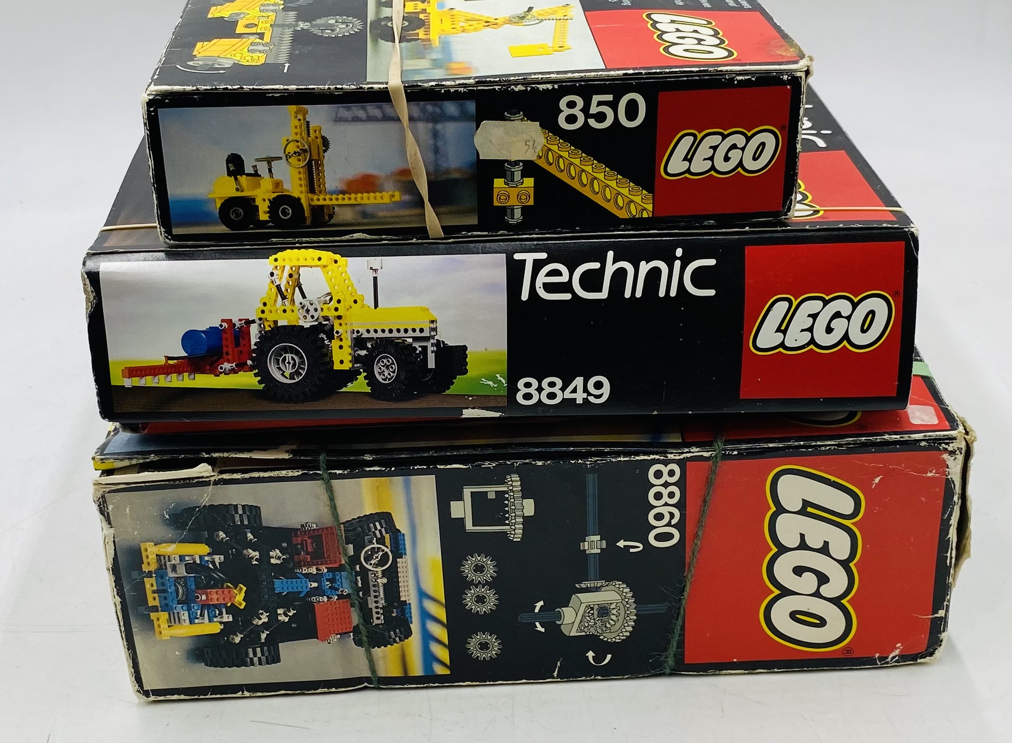 Three boxed vintage Lego Technic sets including Car Chassis (8860), Tractor (8849) and Forklit (850) - Image 5 of 5