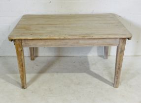 A pine farmhouse table with single drawer 136cm x 89cm, height 75cm