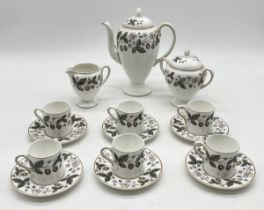 A Wedgwood 'Strawberry Hill' coffee set, comprising coffee cups, saucers, milk jug, sugar bowl and