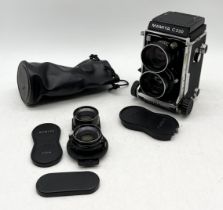 A Mamiya C220 Professional TLR Camera with an additional 80mm lens