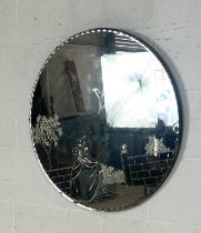 A vintage wall round mirror, with pie crust edging, decorated with an etched design of a lady in