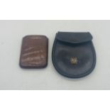 A day sporran along with a crocodile skin cigar case. The sporran is stamped Wm Anderson & Sons,