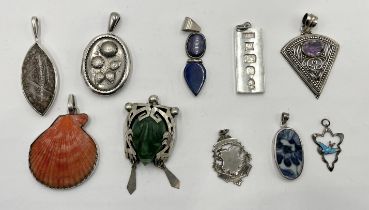 A collection of hallmarked and 925 silver pendants