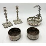 A pair of Georgian style silver plated candlesticks, a Mappin & Webb Princes plate grape stand