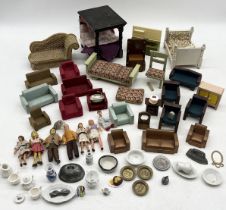 A collection of various dolls house furniture, dolls and accessories
