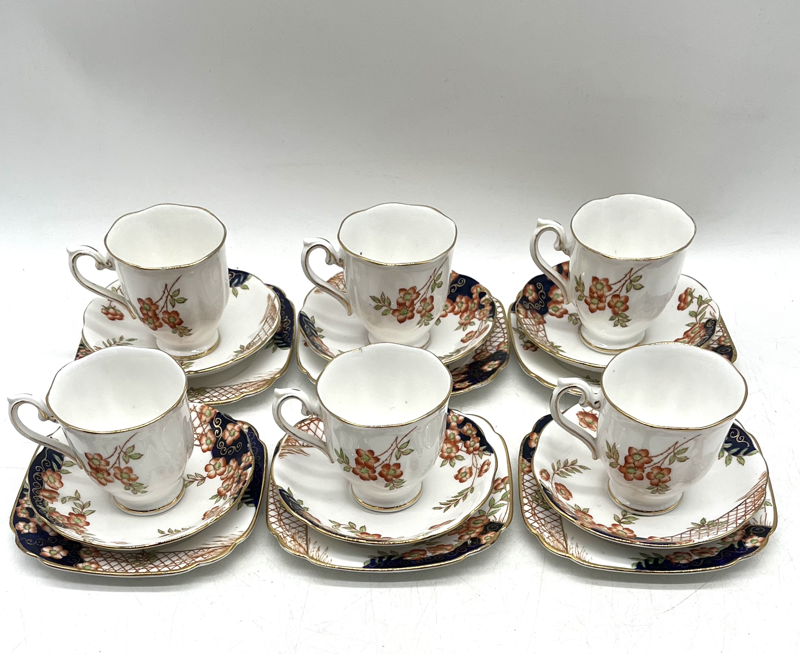 A Royal Albert Crown China tea set pattern 938015 including one sandwich plate, six trios, a milk - Image 7 of 12
