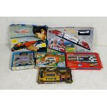 A collection of six boxed children's battery-operated toy train sets including a Dickie Spiezeug