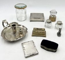 A collection of silver plated items etc. including a pair of inkwells, chamber stick, card case