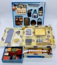 A collection of dolls house accessories a mini chalkboard easel, tailors dummy, collection of books,