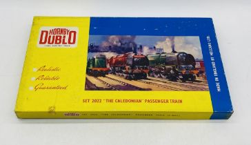 A boxed Hornby Dublo 2-Rail Electric 2022 "The Caledonian" Passenger Train set comprising of British