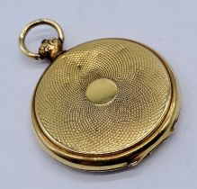 An unmarked 9ct gold locket, total weight 9.5g