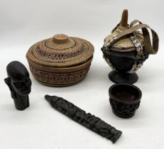 A collection of African items including Ethiopian basket, carved wooden bowl etc.