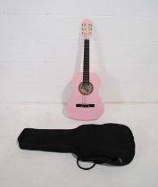 A Herald model HL34PK classical acoustic guitar, in pink with soft case