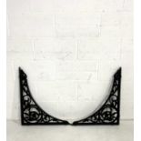 A pair of cast iron wall brackets, 63 cm x 54 cm