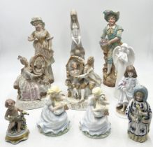 A collection of ceramic figures including Coalport, Royal Worcester etc.