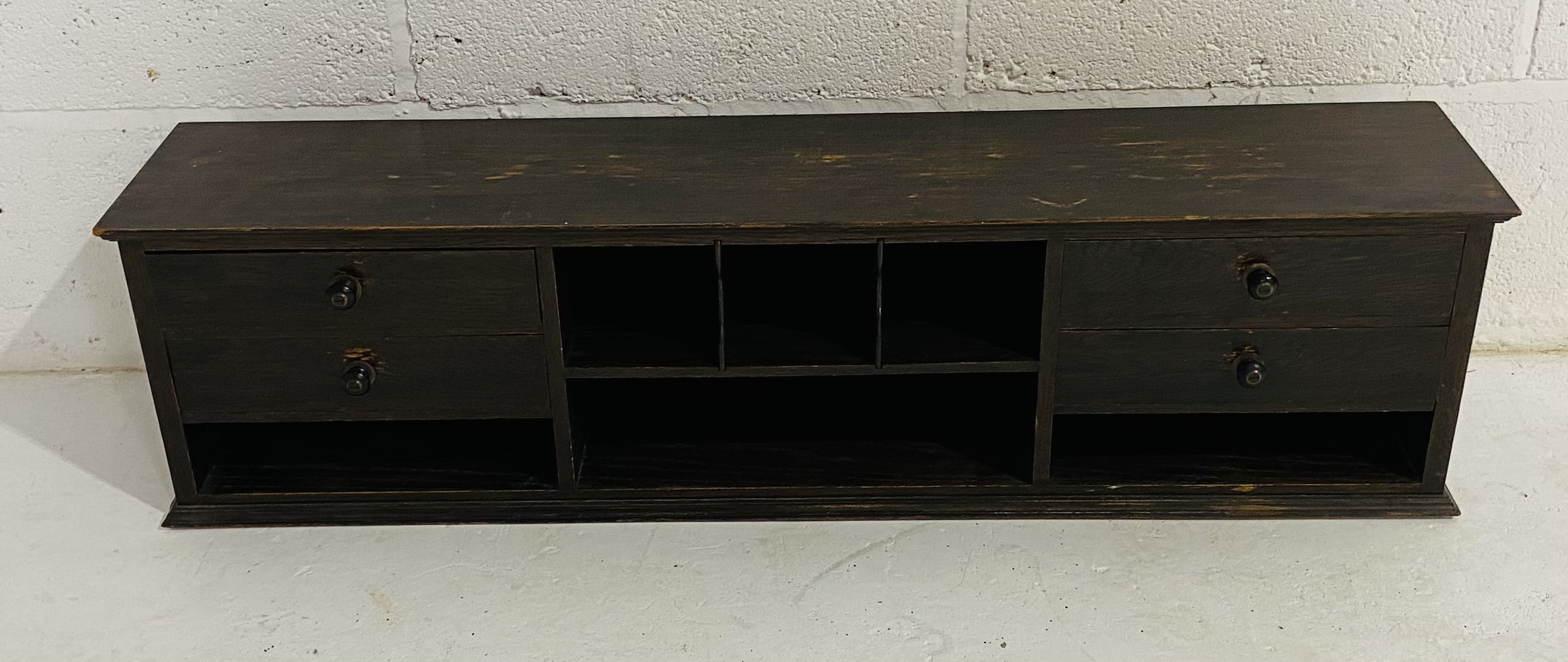 A 1930's Globe Wernicke desk tidy, with pigeonhole fixtures, length 99 cm depth 20 cm width 26 cm.