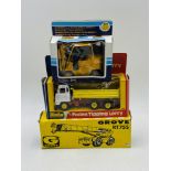 A boxed vintage Dinky Toys Foden Tipping Lorry (432), along with a die-cast Joal Caterpillar fork-