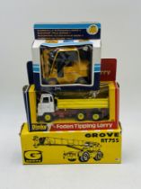 A boxed vintage Dinky Toys Foden Tipping Lorry (432), along with a die-cast Joal Caterpillar fork-