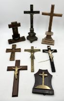 A selection of crosses and crucifixes including freestanding brass example