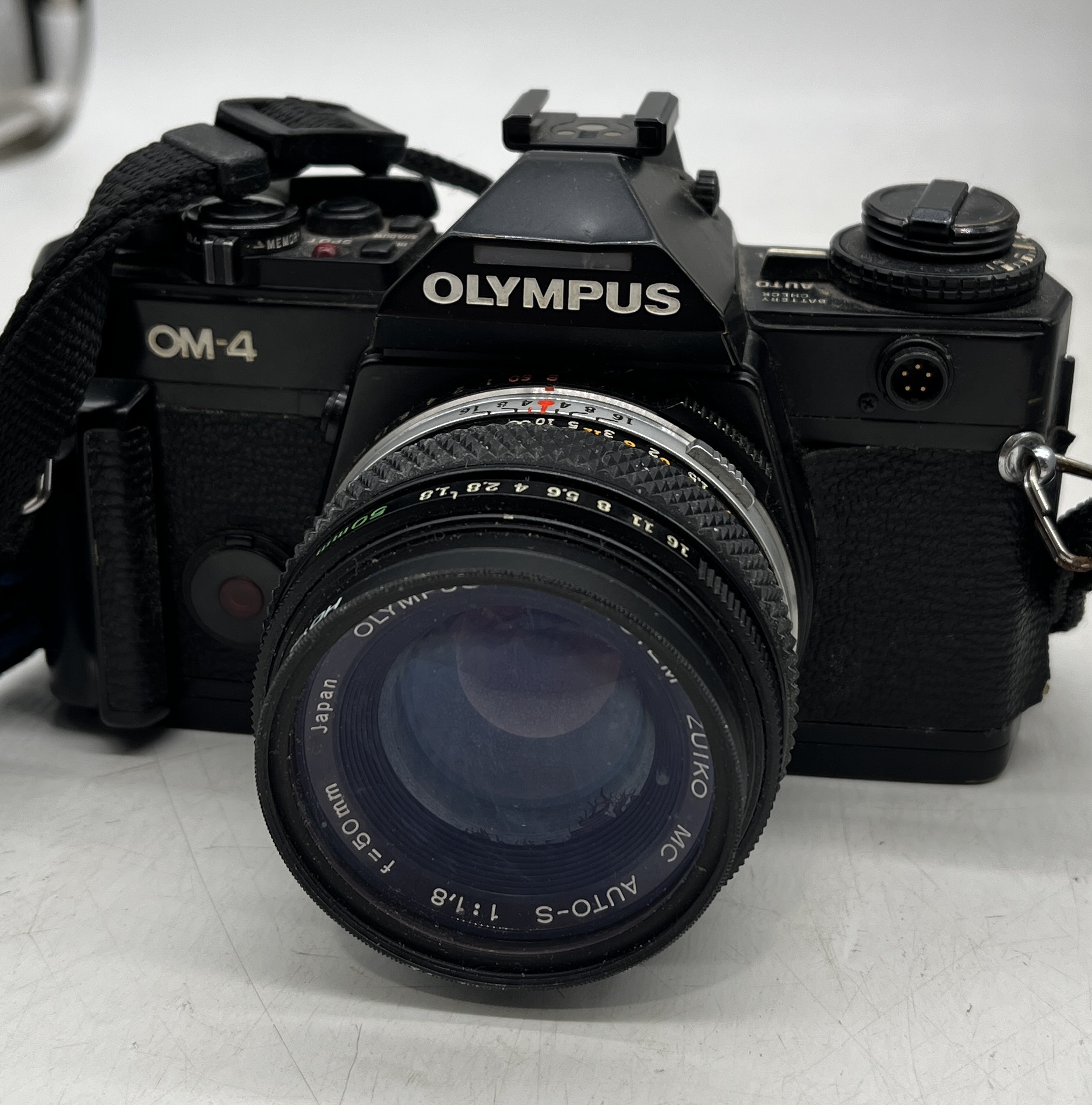 A cased collection of cameras, lenses and accessories including Olympus OM-2, Olympus OM-4 etc. - Image 2 of 7