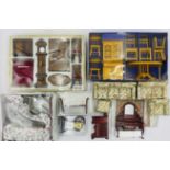 A collection of dolls house furniture including three-piece suite, kitchen set, front room set,