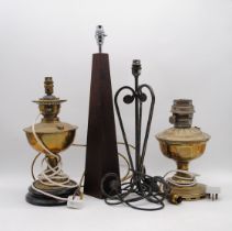 Two converted antique brass oil lamps, along with two modern table lamps